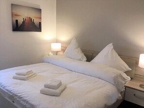 2 dormitorios, tabla de planchar con plancha, wifi y ropa de cama