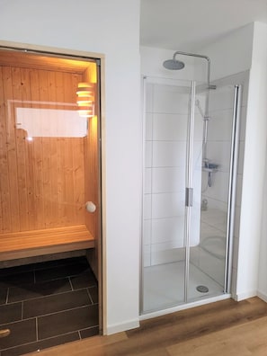 Shower, hair dryer, towels