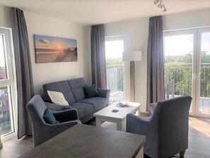 TV - 50.5.S Waterkant - Modern, high-quality vacation apartment, sauna, large balcony, (Wangerland)