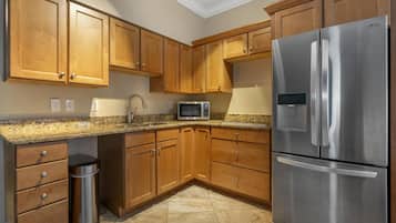 Suite, 1 King Bed, Non Smoking, Balcony | Desk, laptop workspace, blackout curtains, iron/ironing board