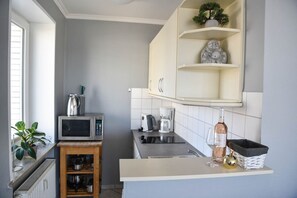 Refrigerador, microondas, parrilla de estufa y lavavajillas 