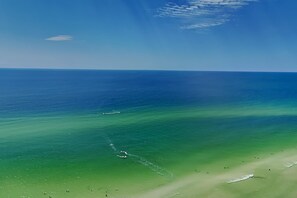 A coastal view with a clear sky and calm sea. - Tidewater Beach Resort #2607 by Resort Collection (Panama City Beach)