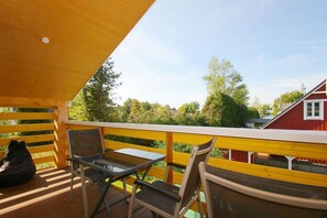 Outdoor dining - Vacation home Saga - close to the beach, modern house with own sauna, garden, terrace - (Wiek)