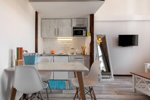 Luxury Studio, Kitchen, Courtyard View | Private kitchen | Full-sized fridge, microwave, stovetop, electric kettle - Cozy Studios on Freedom Square (Tbilisi)