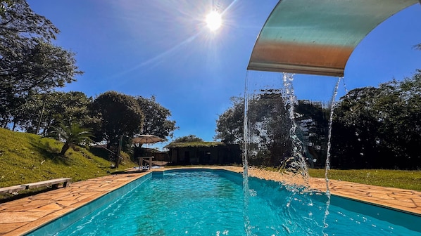 Outdoor pool, pool umbrellas, pool loungers