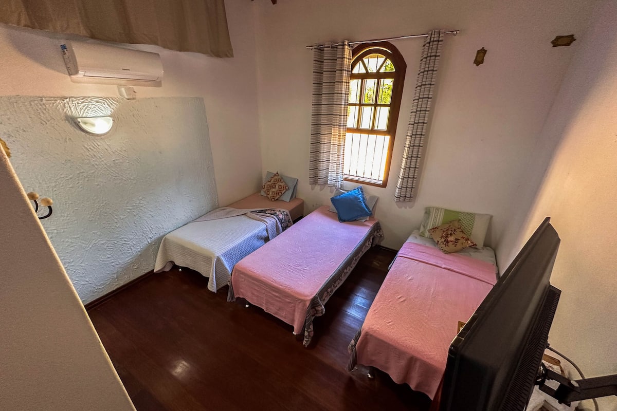 Deluxe Triple Room, 1 Bedroom | Individually decorated, blackout curtains, iron/ironing board, free WiFi