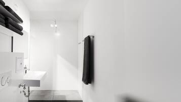 Comfort Condo | Bathroom | Bathtub, hair dryer, towels, soap