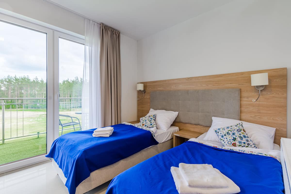 Deluxe-Doppel- oder -Zweibettzimmer | 1 Schlafzimmer, Zimmersafe, Schreibtisch, laptopgeeigneter Arbeitsplatz