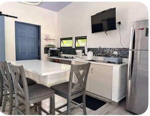 Fridge, microwave, coffee/tea maker, toaster