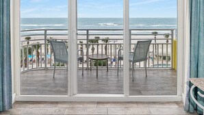 A balcony with a view of the beach and ocean. - Luxury 5th Floor 3 BR Condo Direct Oceanfront Wyndham Ocean Walk Resort Daytona Beach | 504 (Daytona Beach)