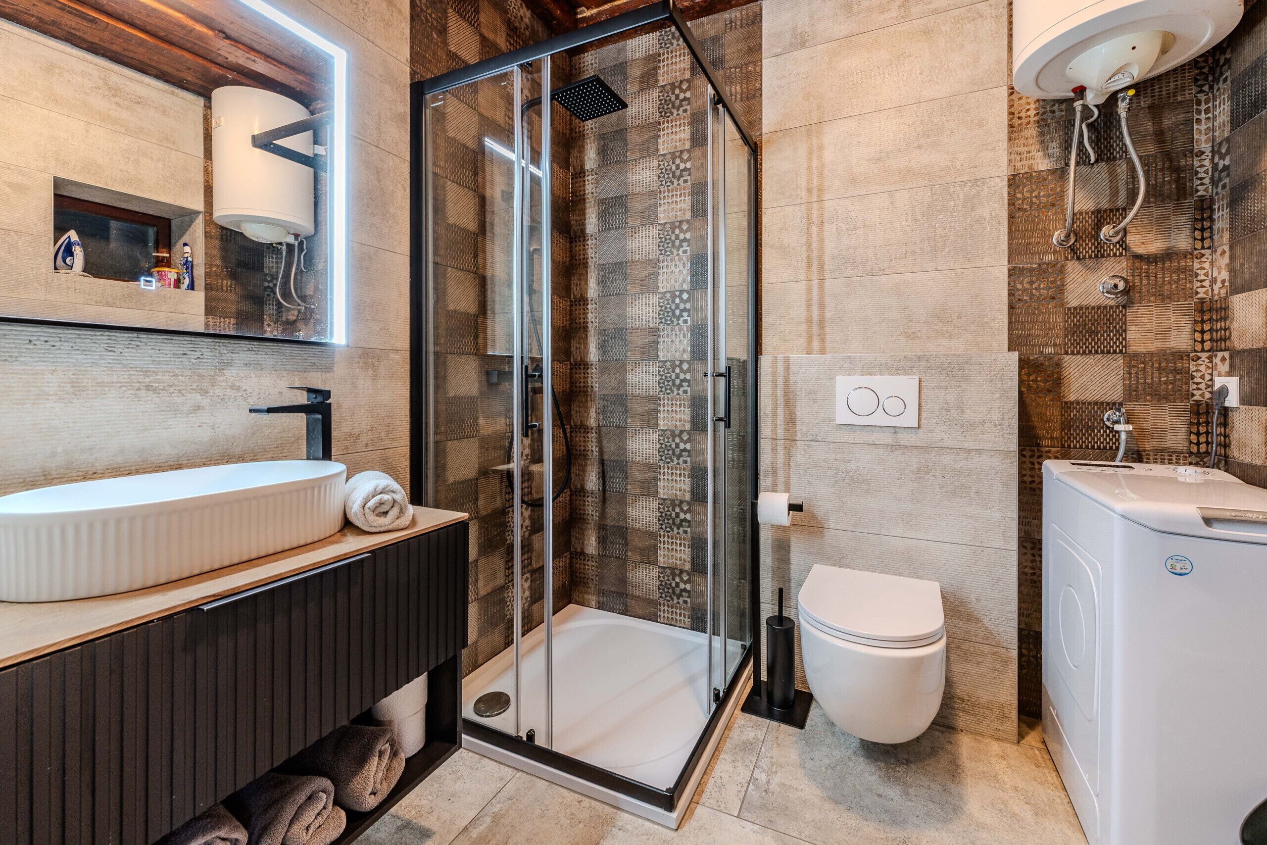 Bathtub, hair dryer, towels