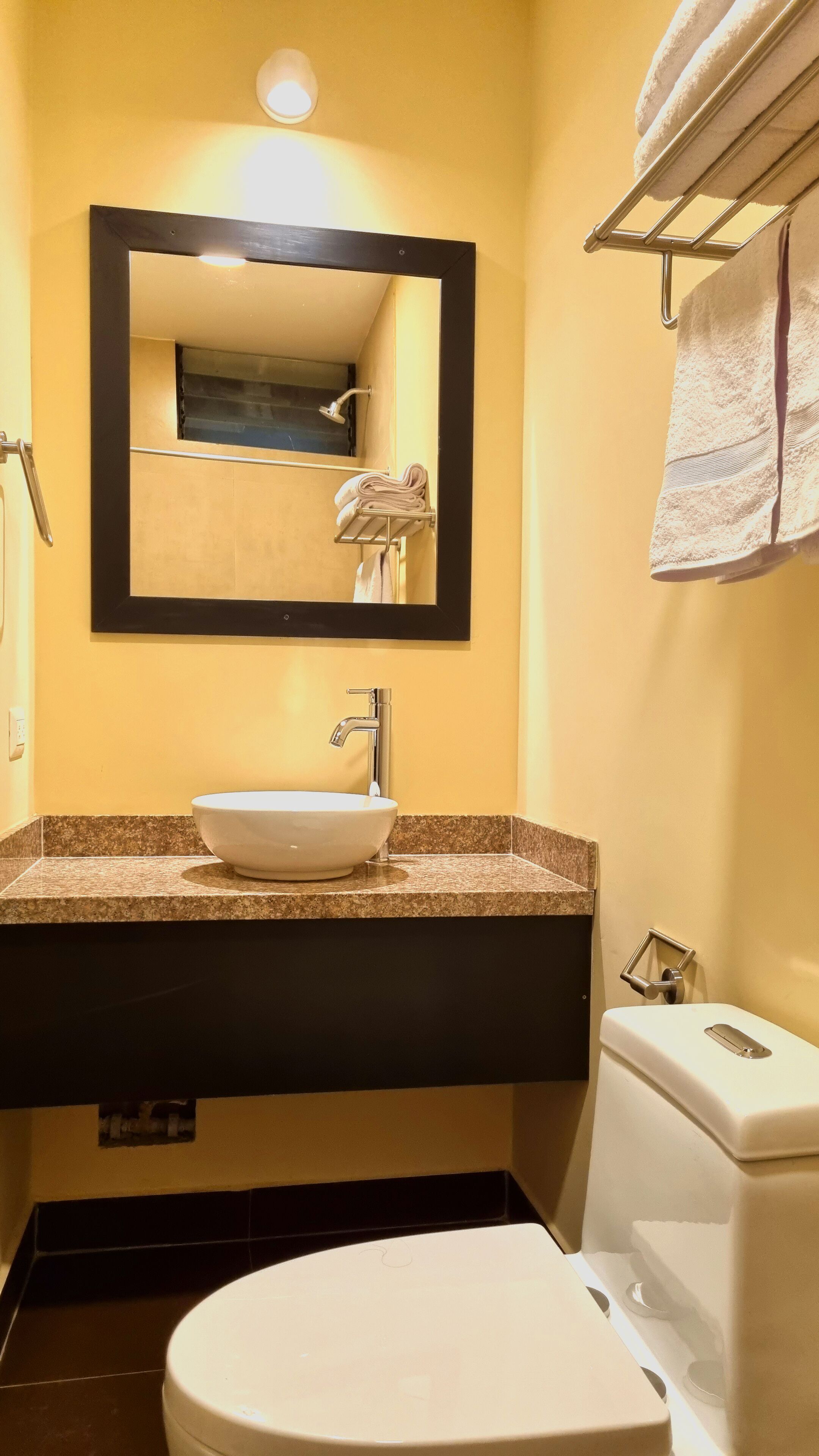 shower, rainfall showerhead, hair dryer, towels