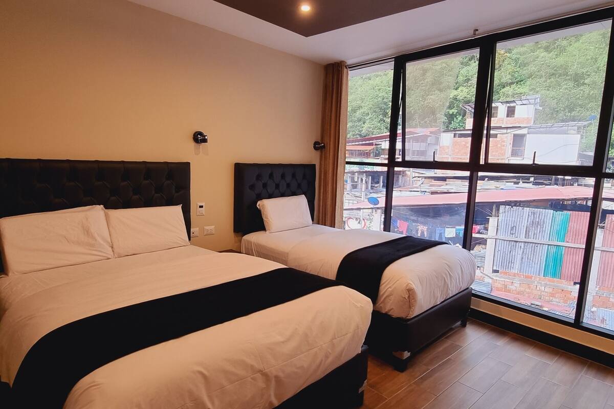 down duvets, pillow-top beds, desk, laptop workspace