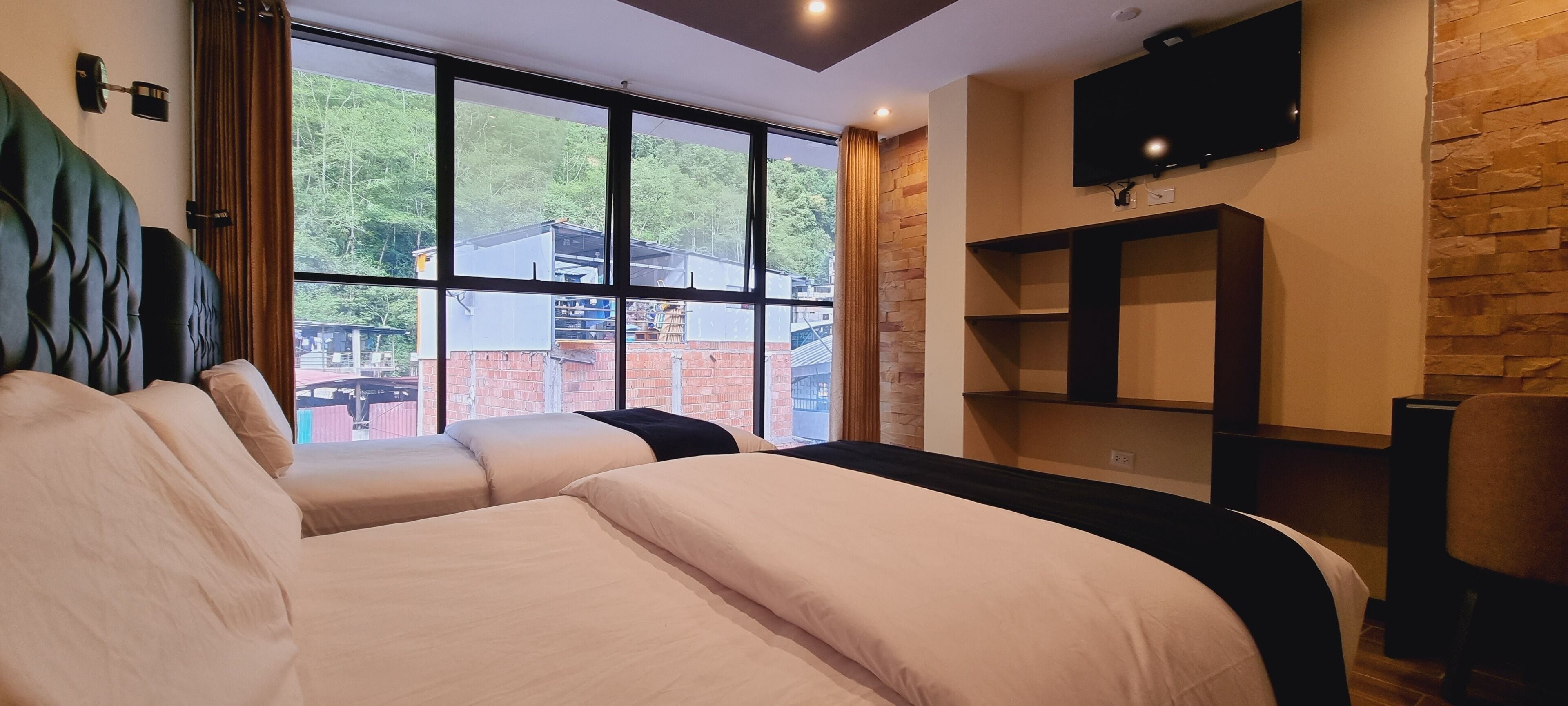 family room | down duvets, pillow-top beds, desk, laptop workspace