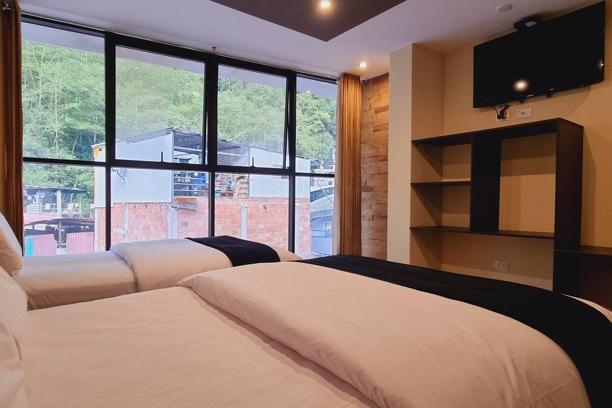 family room | down duvets, pillow-top beds, desk, laptop workspace