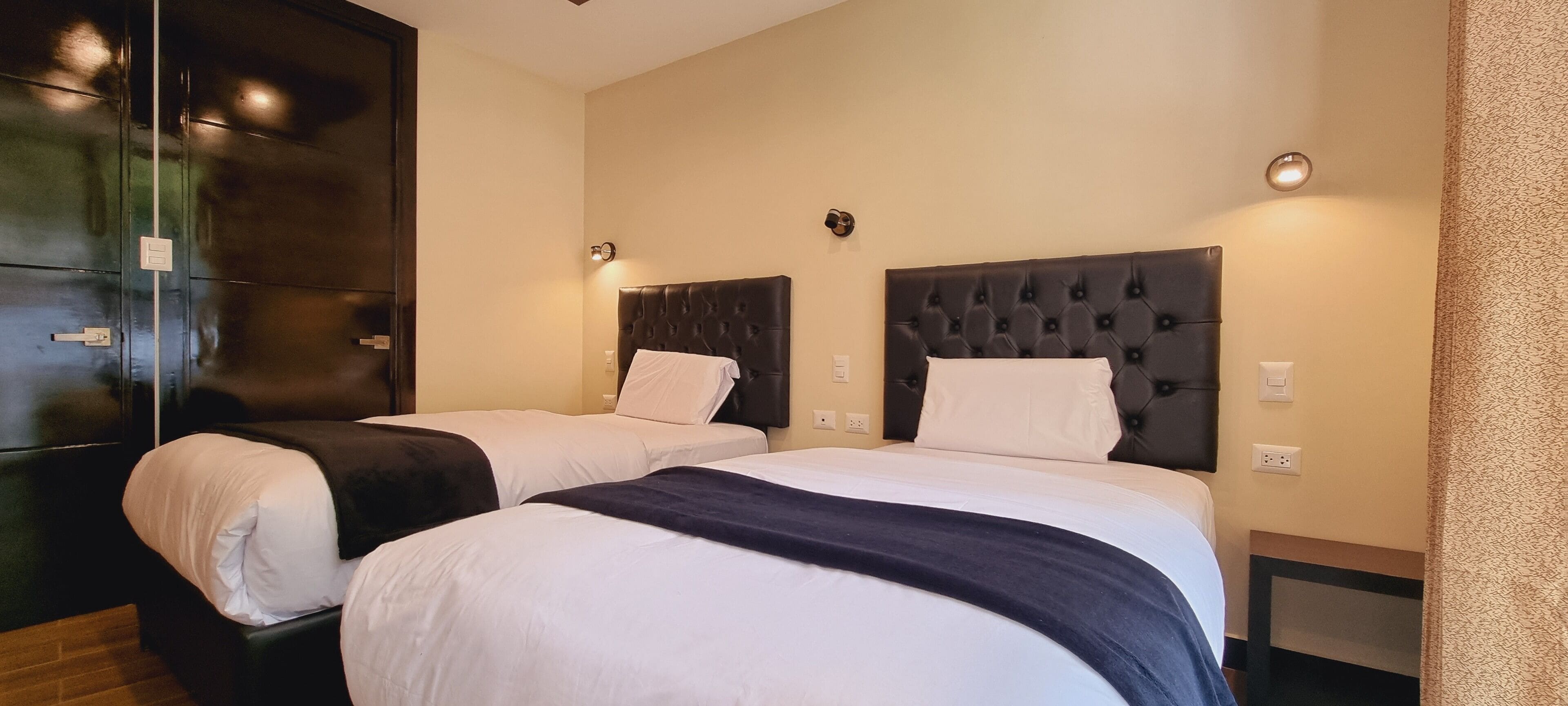 family room | down duvets, pillow-top beds, desk, laptop workspace