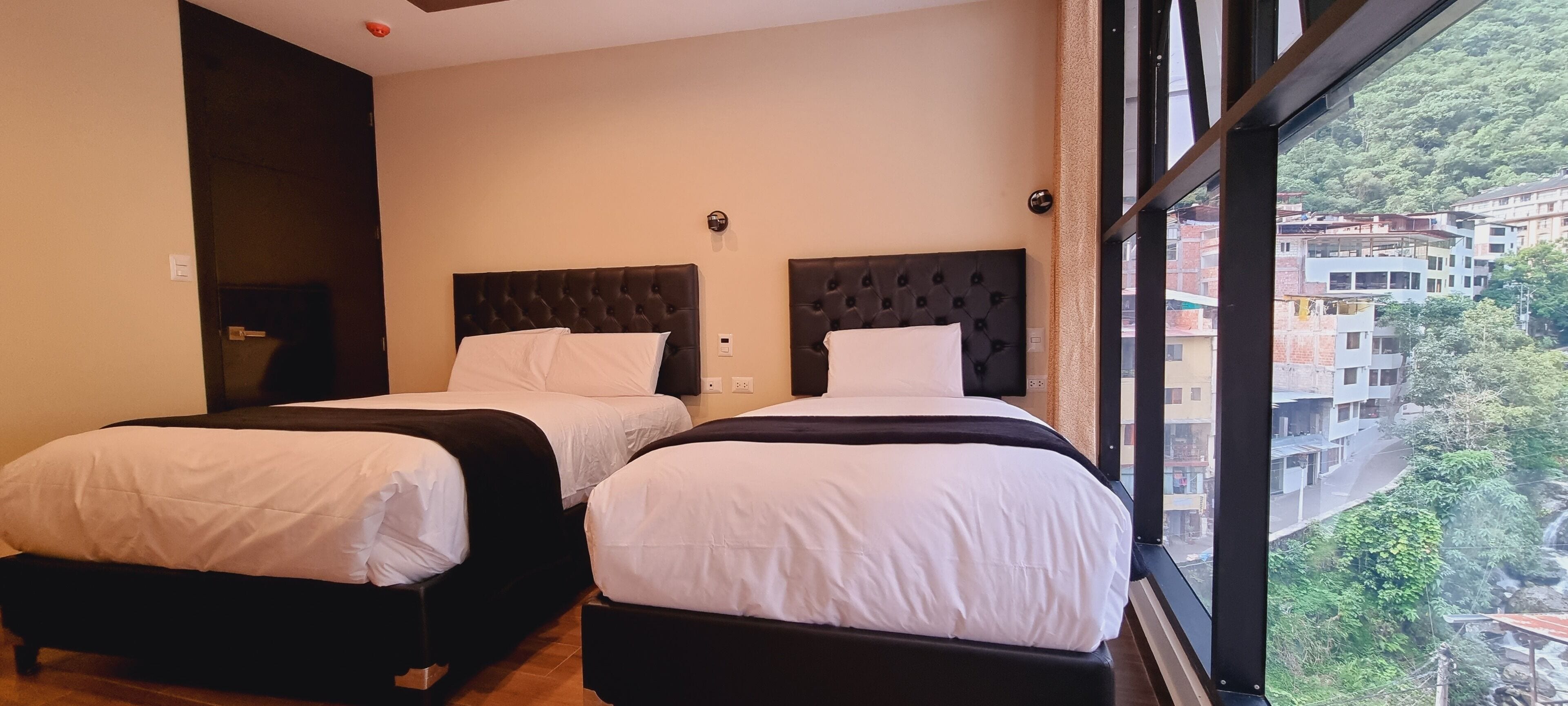 family room | down duvets, pillow-top beds, desk, laptop workspace