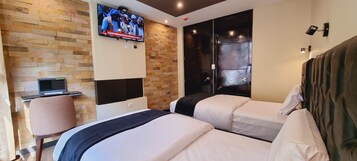 Family Room | Down comforters, pillowtop beds, desk, laptop workspace