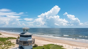 On the beach, sun loungers, beach towels