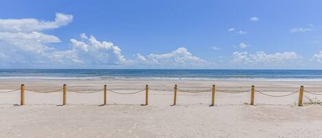 On the beach, sun loungers, beach towels