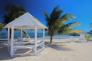 Private beach, white sand, sun loungers