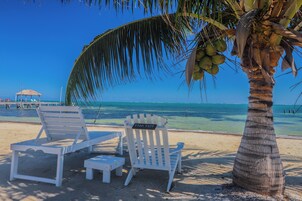 Private beach, white sand, sun loungers