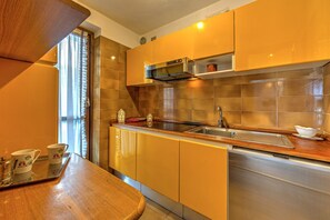 Fridge, microwave, cookware/dishes/utensils