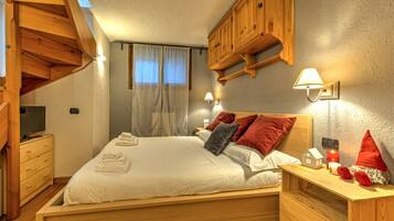 1 slaapkamer, een strijkplank/strijkijzer