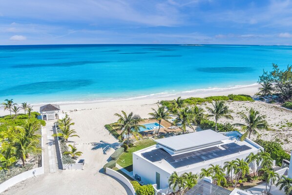 On the beach, sun-loungers, beach towels