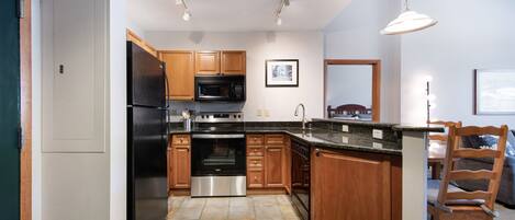 Condo, 2 Bedrooms | Private kitchen | Fridge, oven, coffee/tea maker, toaster