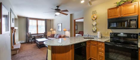 Condo, 2 Bedrooms | Private kitchen | Fridge, oven, coffee/tea maker, toaster