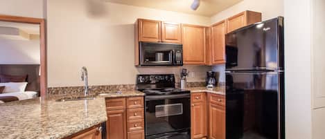 Condo, 2 Bedrooms | Private kitchen | Fridge, oven, coffee/tea maker, toaster