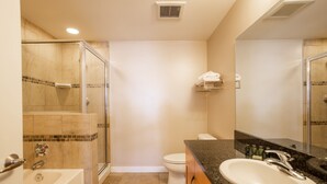 A bathroom with a bathtub, a sink, a toilet, and a shower. - Fraser Crossing/Founders Pointe, Condo | 2 Bedroom (Value-Rated Condo 4281) (Winter Park)