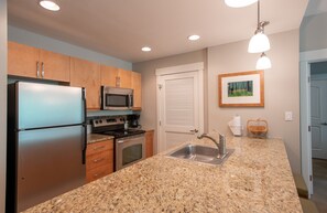 Condo, 2 Bedrooms | Private kitchen | Fridge, oven, coffee/tea maker, toaster