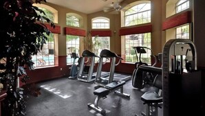 A gym with treadmills, weight machines, and a bench. - Cozy 1-Bdrm Scottsdale Condo next to pool (Scottsdale)