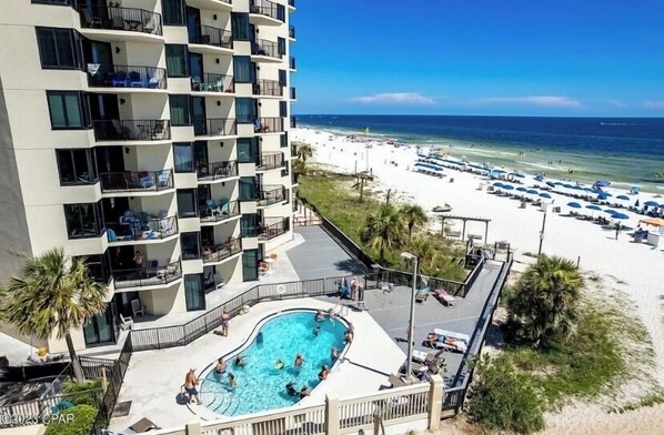 Outdoor pool, a heated pool - TOTAL BEACH VIBE with additional amenities for that perfect getaway. (Panama City Beach)