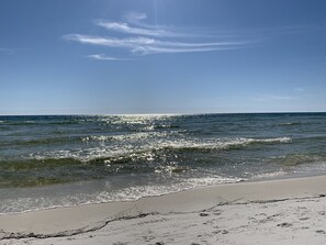 On the beach, sun-loungers, beach towels