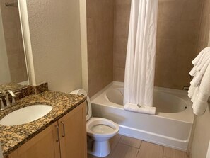 Separate tub and shower, rainfall showerhead, free toiletries, towels - Lovely Resort Condo (Tampa)