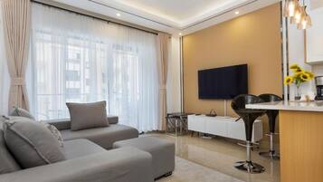 Apartemen, 1 kamar tidur | Area keluarga | TV layar datar