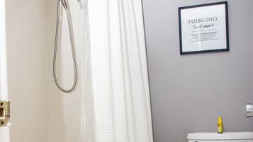 Combined shower/bathtub, hair dryer, towels, soap