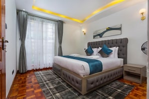 Apartment, 1 Bedroom | 1 bedroom, iron/ironing board - Tranquil Residence by Edmor Suites (Nairobi)