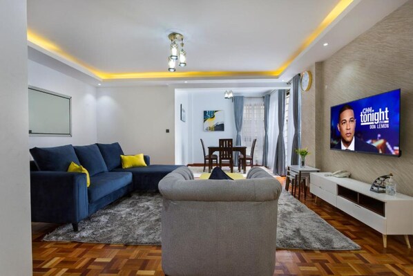 Apartment, 1 Bedroom | Living area | Flat-screen TV - Tranquil Residence by Edmor Suites (Nairobi)