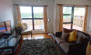 Familjehus (Muri Motu Outlook House) | Vardagsrum | 32-tums platt-tv med satellitkanaler och tv