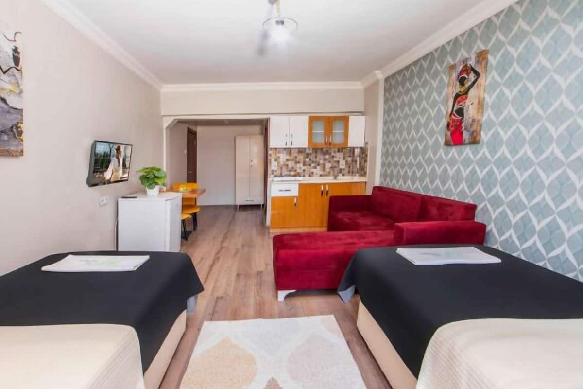 junior twin room | premium bedding, desk, laptop workspace, blackout curtains