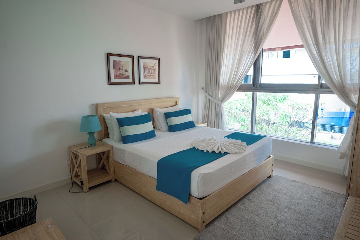 Standard Apartment, 2 Bedrooms, Kitchen, Pool View | 2 bedrooms, individually decorated, individually furnished, desk