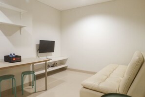 Quarto | Área de estar | TV