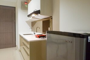 Camera | Cucina privata | Frigorifero, piano cottura, pentole/stoviglie/utensili