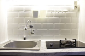 Fridge, stovetop, cookware/dishes/utensils
