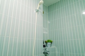 Room | Bathroom | Shower, free toiletries, towels, shampoo - Homey And Simply 2Br At Cinere Resort Apartment (Depok)