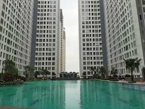 Outdoor pool - Cozy And Comfort Living 1Br At M-Town Residence (Gading Serpong)